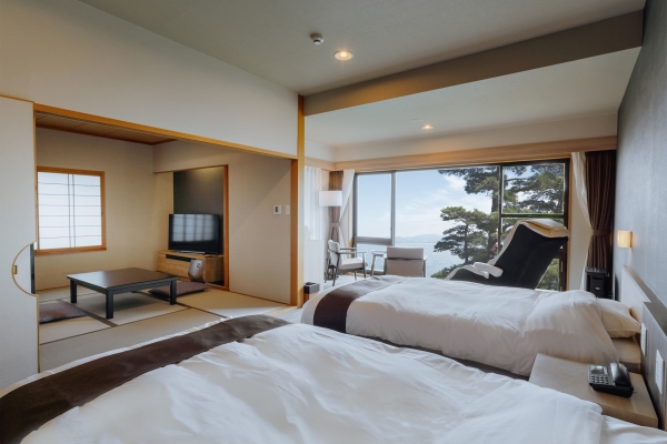 部屋面積：57㎡／最大定員：6名（和室3名、ベッド3名） 本館 和洋室